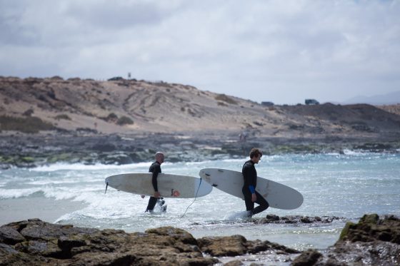 two surfers