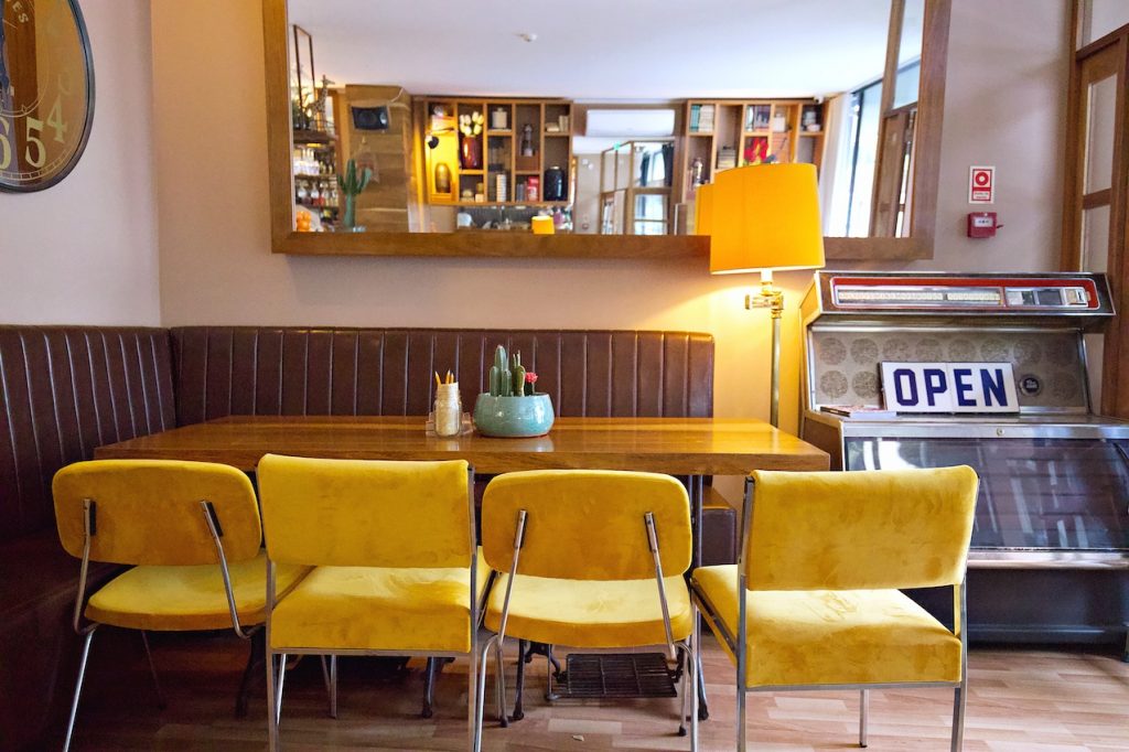 Table at the entrance of Negra Cafe Porto