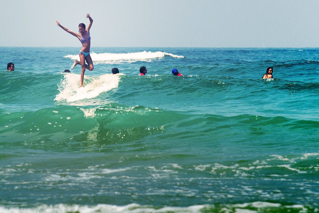 Best places to surf in Europe, Female longboard surfer at Biarritz, France