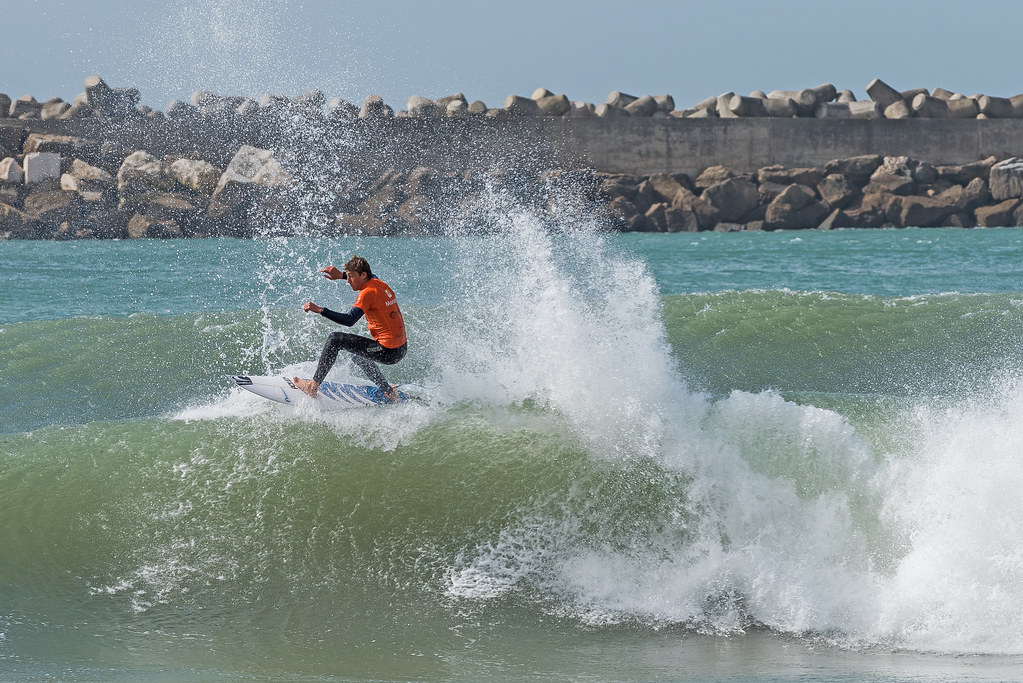 Surfer on a wave at Peniche, Portugal